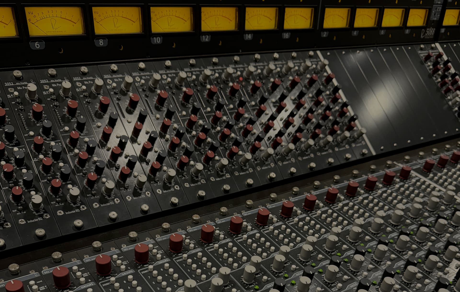 Indie artist in a dimly-lit rehearsal space